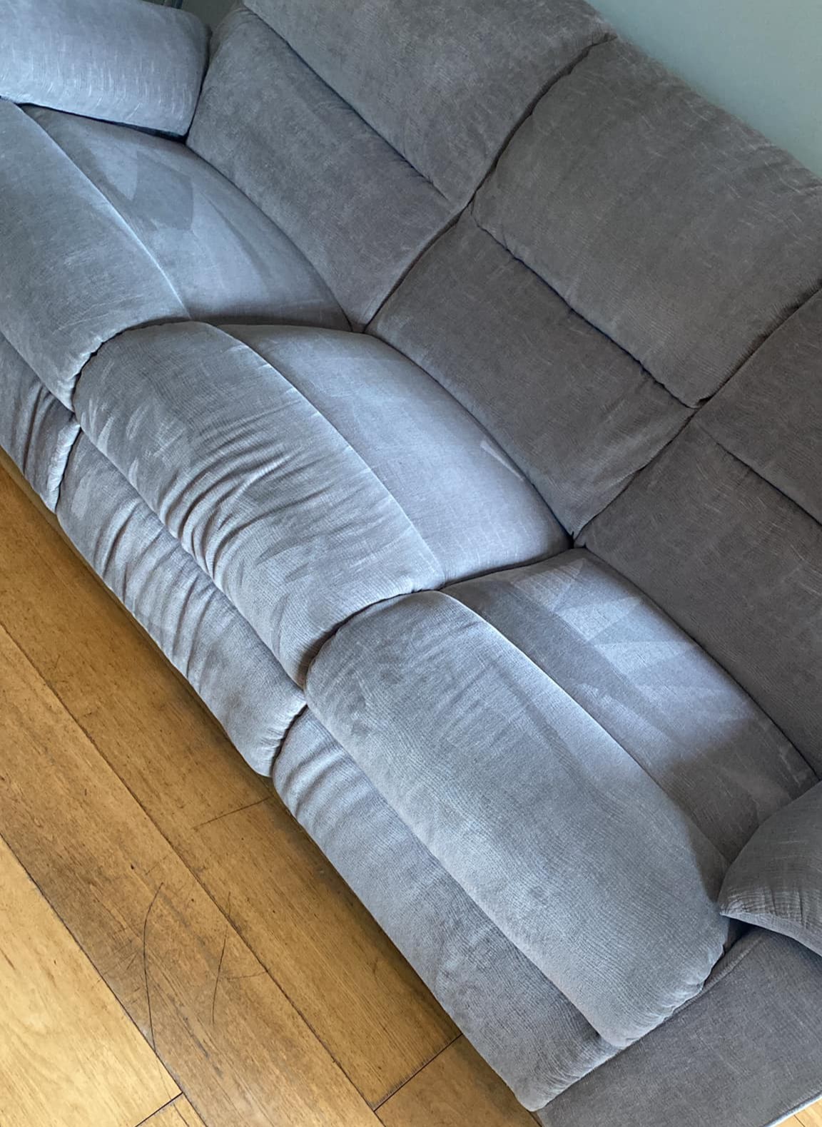 A couch that has been cleaned by an upholstery cleaning professional