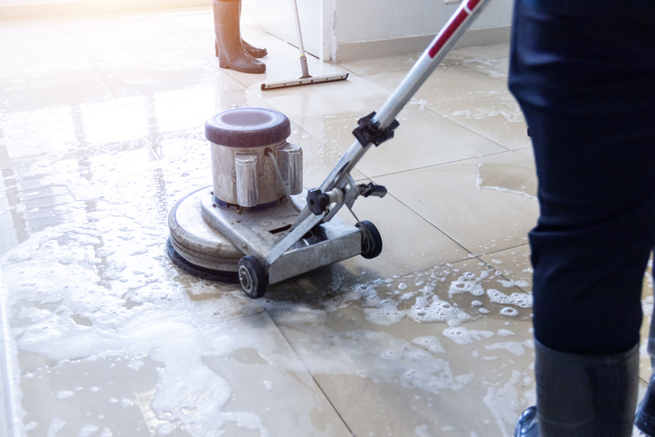 Clean Pro using a tile and grout cleaner to clean a floor in Galway