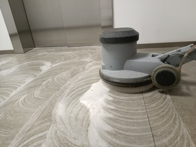 grout cleaning machine being used to clean a floor